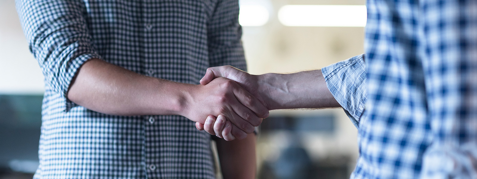 two people shaking hands